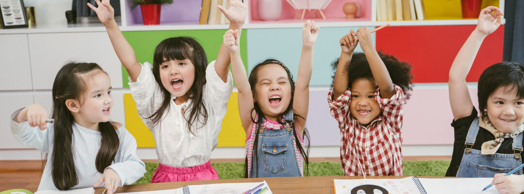 A photograph of a diverse group of children at school.